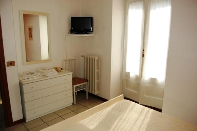Albergo Del Cacciatore Cremeno Rom bilde